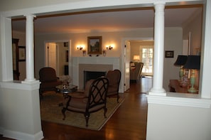 foyer with view of formal living room and family room