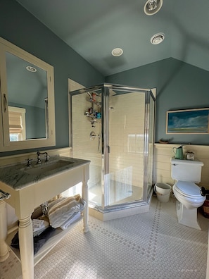 Guest Bathroom with large rain shower, great linens!