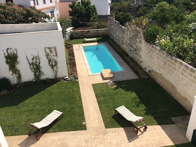 Village home just restored with private garden and pool 