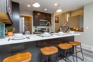 Kitchen bar seats 4 comfortably