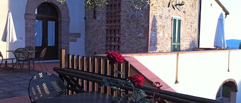 Monache 1 veranda overlooking the gardens and countryside