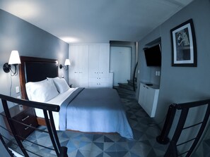Queen size bed is on second level