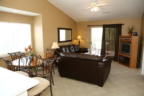 Living area includes a TV set with Cable services.