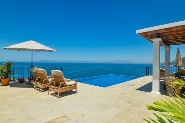 Breathtaking view of Banderas Bay from the private infinity pool