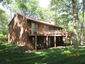 Trees surrounding the house give a feeling of nature and tranquility