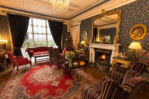 Relax in our William Morris style drawing room