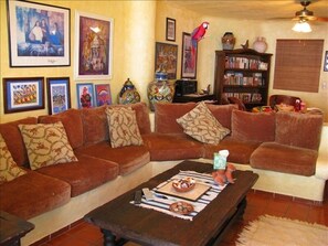 Living Room, patio,  TV, view of beach and water, boats, dolphins and sunsets