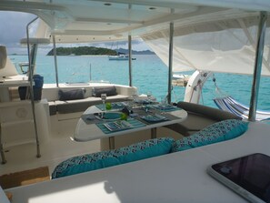 Dining in a blissful anchorage on La Vie Yacht Charters