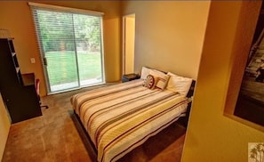 bedroom 3 with queen size bed and private show/tub