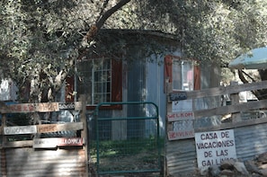 outside view of Cabin with Welcome in many languages