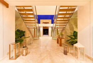 Entry way features two stair ways to the second level