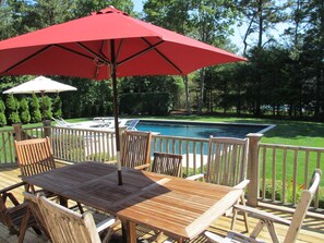 Al fresco dining on the deck overlooking the pool.