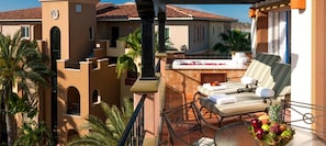 balcony with outdoor hot tub