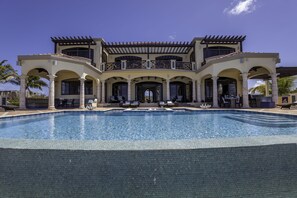 Relax on the pool's viewing ledge or stretch out on one of the built-in lounges