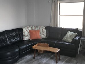 Open living room and kitchen area.  