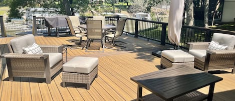 View of deck with furniture. 