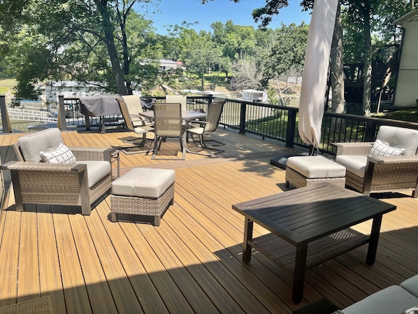 View of deck with furniture. 