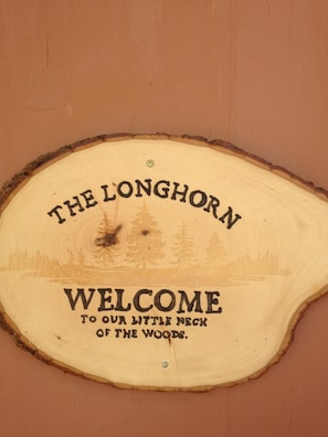 Welcome to our little neck of the woods in the Longhorn Cabin-cozy and comfy
