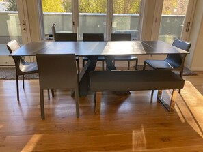 Dining Table expanded to seat 8 or 9 guests. Entertain with a fabulous view!