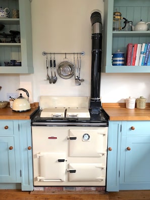 Oil fired Rayburn to cook on (plus a conventional oven & hob too if you prefer)