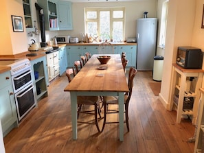 Well equipped farmhouse kitchen, with table seating up to 12 people