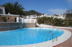 The pool is a short walk away. Actually its 2 pools behind a gated entrance.