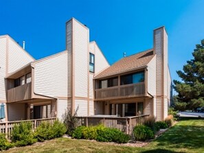Big deck with hot tub and golf course and mountain views