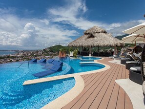 award winning infinity pool with 360 degree views of the Bay and Old Town