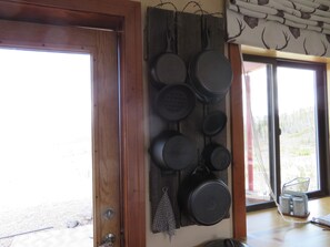 Cast iron cookware  available for cooking on the outdoor kitchen 

