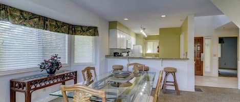 Dining Room Area Open To Kitchen Breakfast Bar *The unit shown is representative of similar units