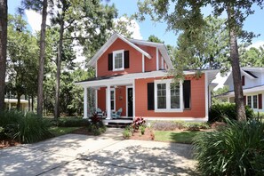 Front of cottage and parking