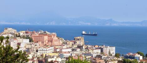 View of Historic Centre and the Bay of Naples. Sorrento on the far shore