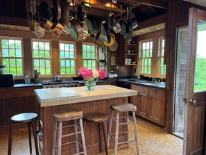 kitchen with center island for cooking and gathering