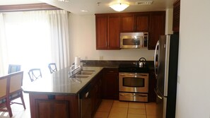 Kitchen overlooks dining room