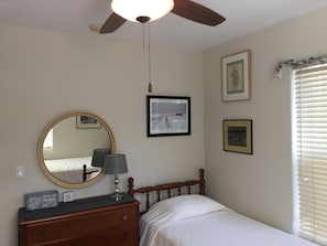 Two twin beds are in the guest room