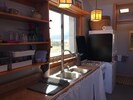Kitchen, stove, looking toward WC.