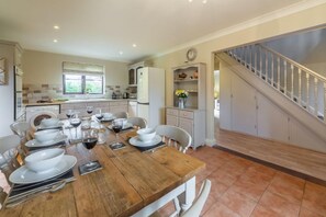 Ground floor: Large dining table and spacious Kitchen