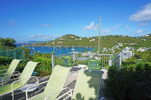 Your view to the west overlooks Great Cruz Bay Harbor with St Thomas in the distance