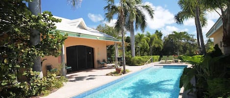 Tennis Villa offers a 43' pool, private tennis court and spacious accomodations