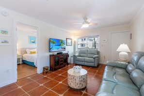 Living room with 55" Smart TV including local Spectrum channels.