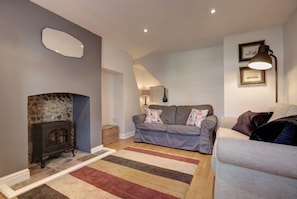 The Cabin, Wells: Sitting room with electric 'stove'