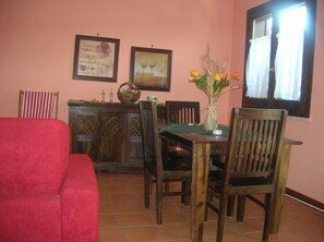 the living room with sofa bed