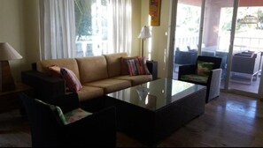 Living room with sliding doors to terrace
