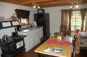 Table for 2 and Kitchenette in Tranquililty Cabin
