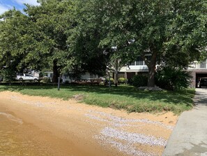 Easy, gentle sloping 60 ft private beach with freshwater mussels shells.