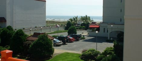 View of the beach from living room deck