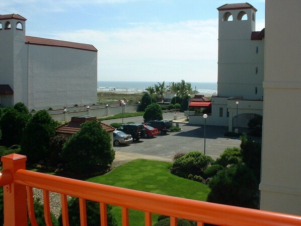 View of the beach from living room deck
