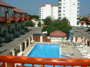 View of pool from master bedroom deck