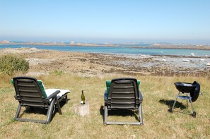 A small grassy hill facing the sea