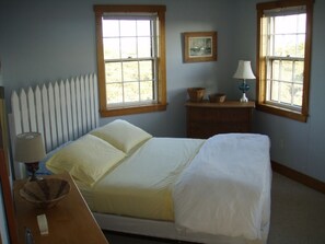 Upstairs bedroom with queen